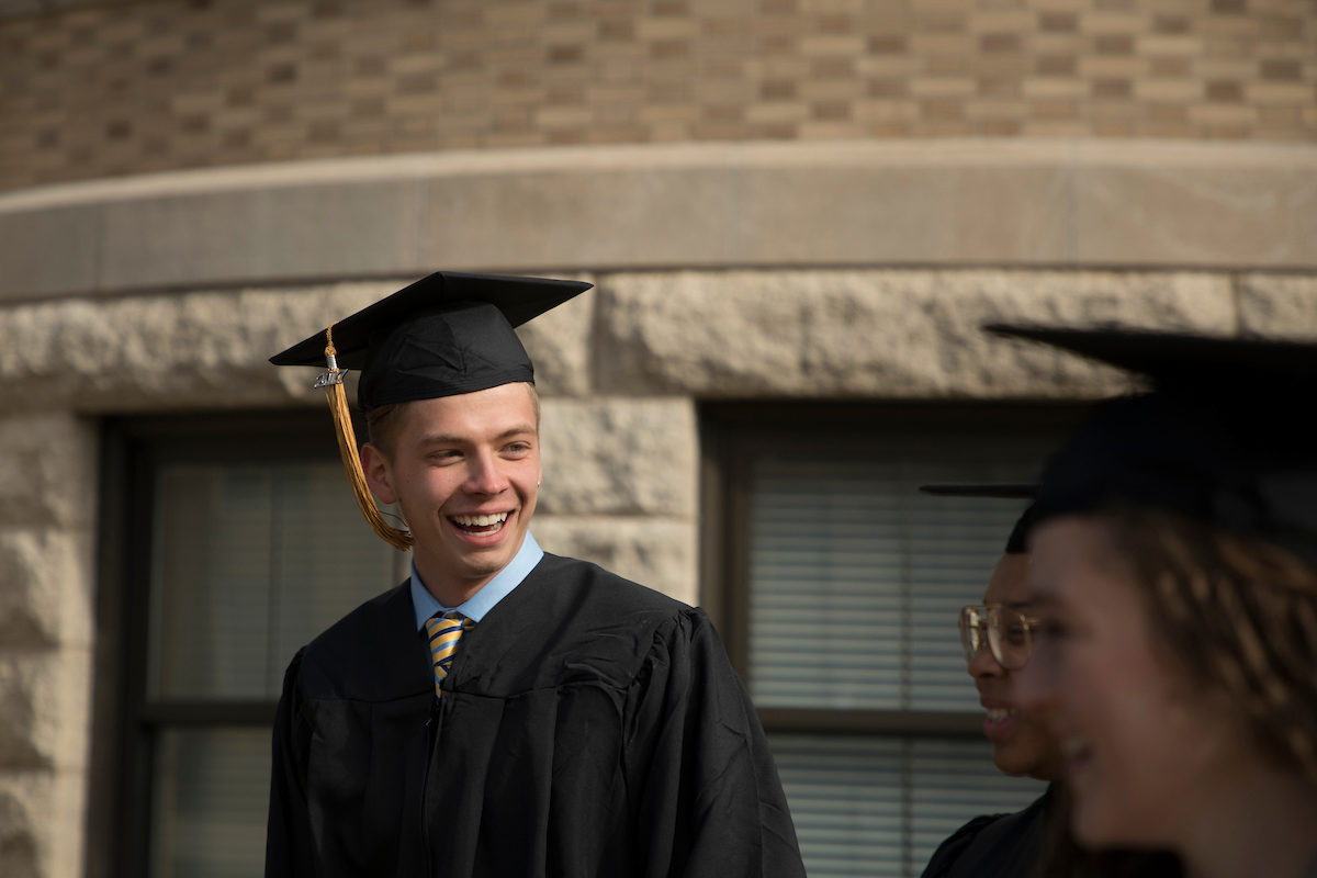 Matt Dorsey in graduation cap and gown