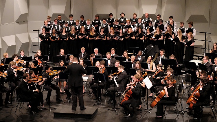Choir and orchestra perform together