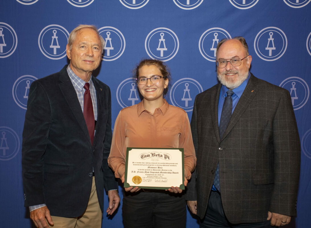 Jennifer Collens and Steve Watkins receive an honorable mention for improved membership from James D. Froula, executive director emeritus (left) at the Tau Beta Pi Association 116th National Convention in Knoxville, TN on Saturday, Oct. 1.