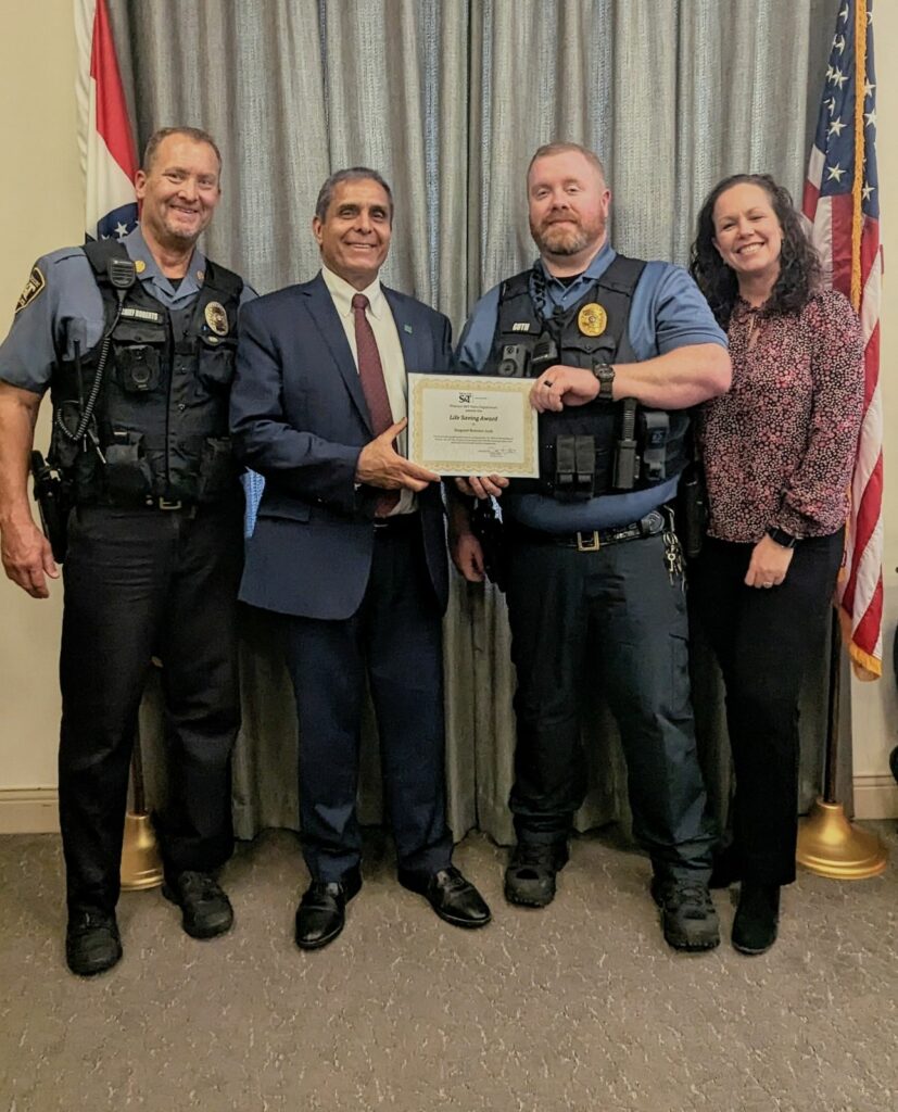 Sgt. Brandon Guth receives the Life Saving Award.