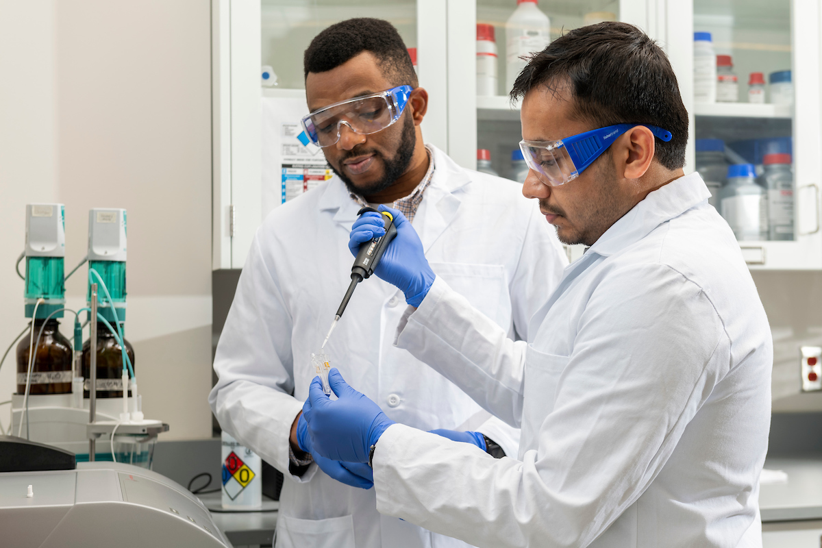 Dr. Monday Okoronkwo works with Rupack Halder, Ph.D. student in chemical engineering, in Okoronkwo's lab.