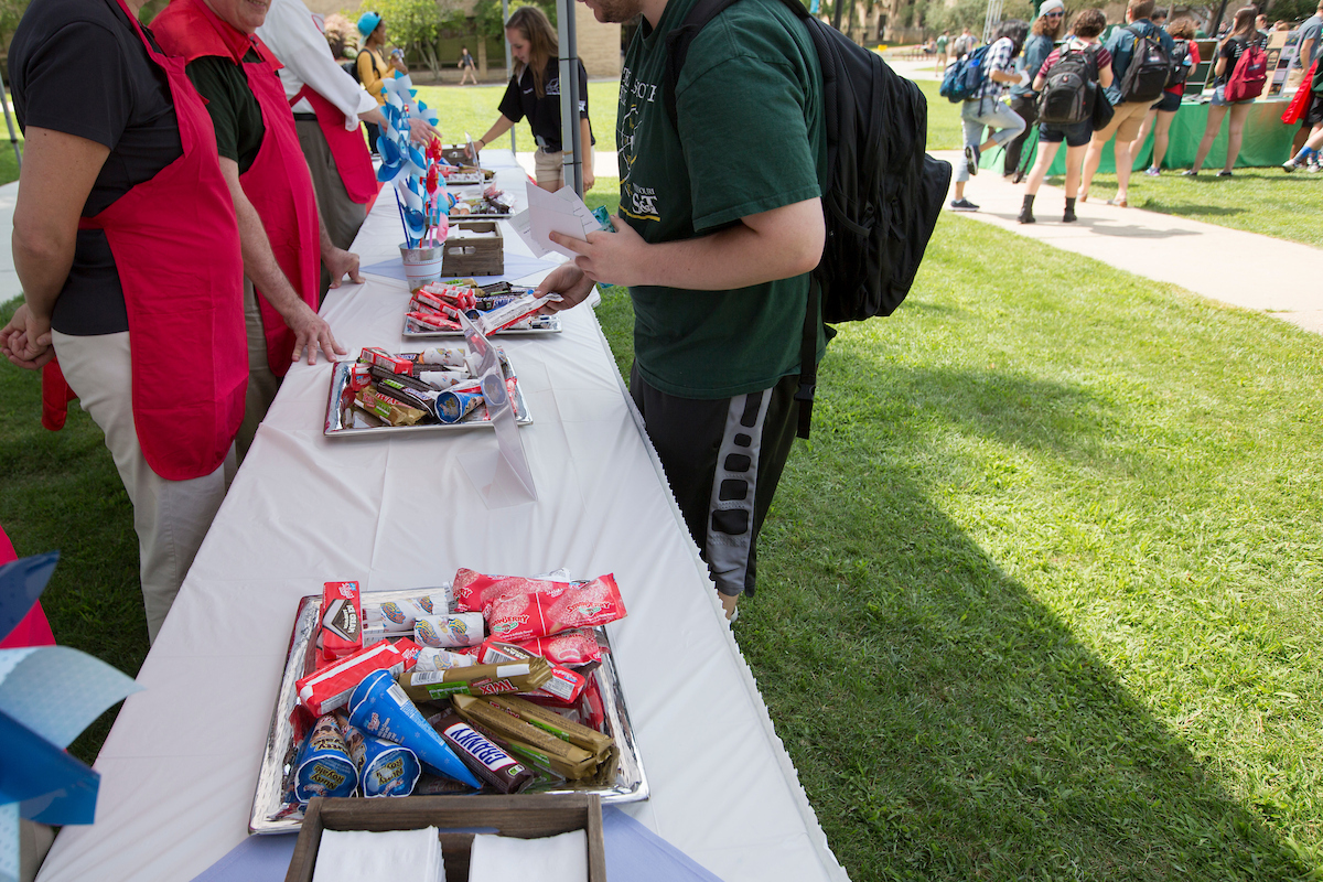 Ice cream treats sit on a table for MinerRama attendees to pick up.