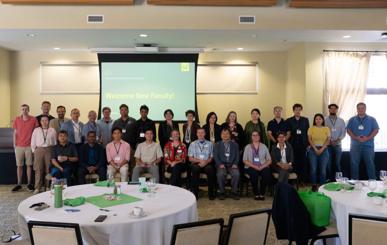 A group of 30 new faculty members.