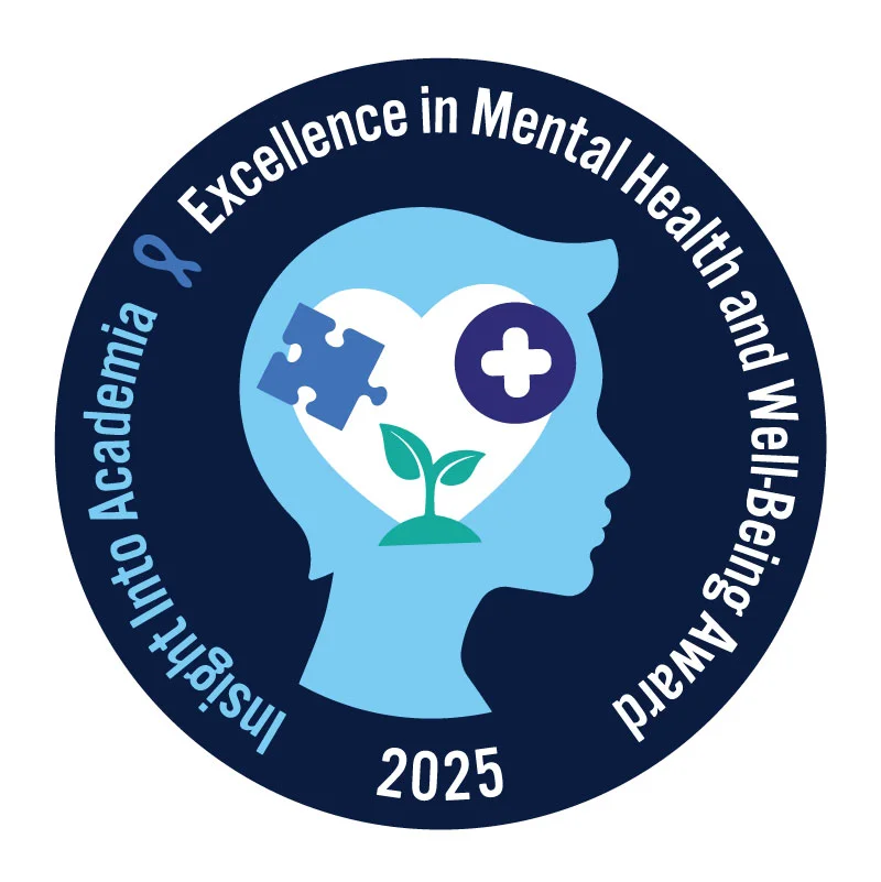 A circular logo features a blue profile silhouette with a heart inside. The heart contains a puzzle piece, a plus sign, and a plant. Text reads "Excellence in Mental Health and Well-Being Award, Insight Into Academia, 2025." A ribbon icon symbolizes awareness.