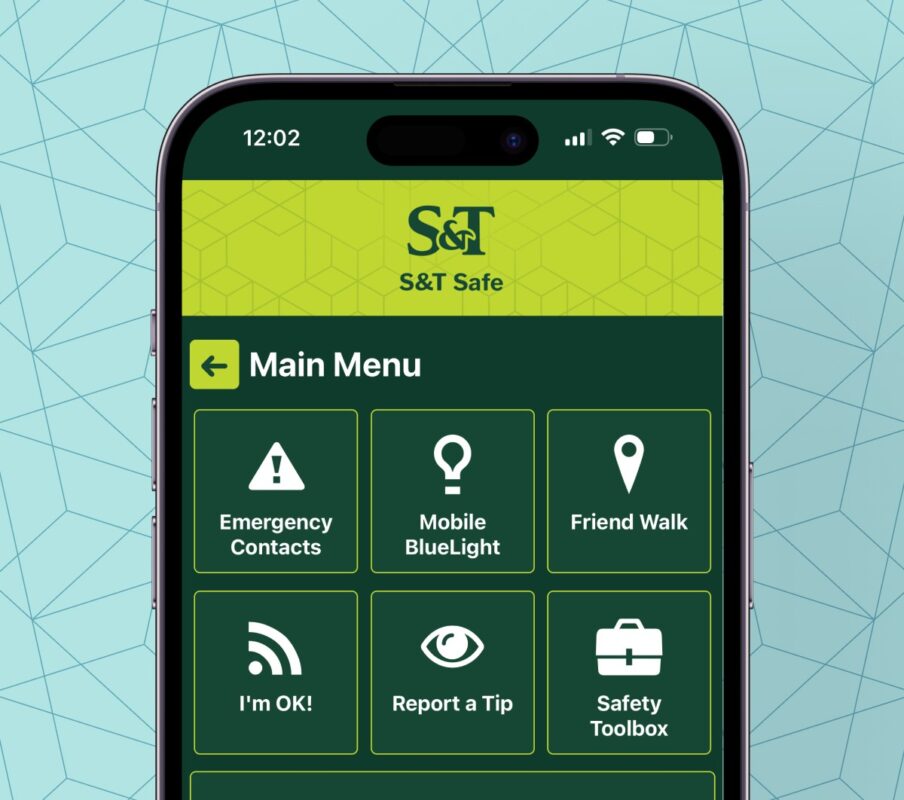 A mockup of an iPhone with the dashboard of the S&T Safe app displayed on the screen.