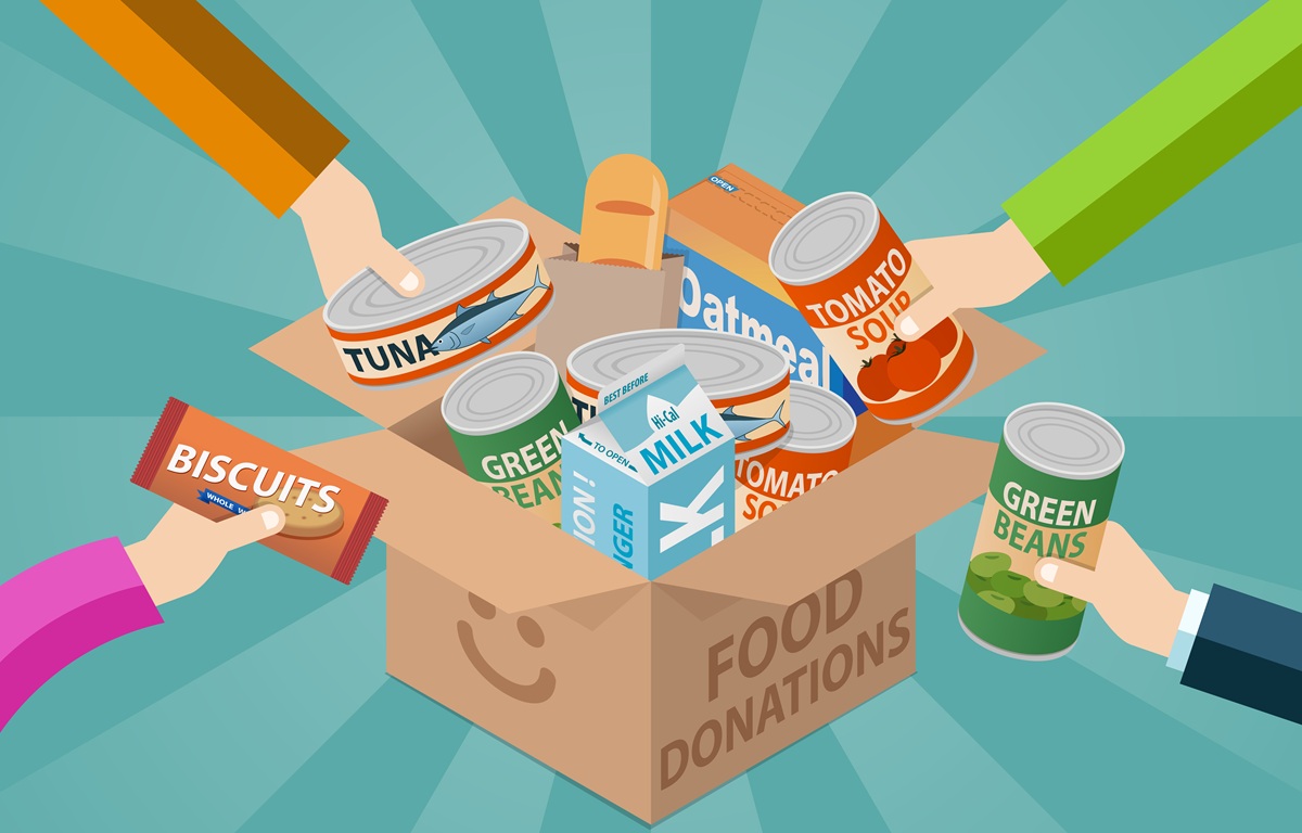 A box that says food donations with many hands holding food items.