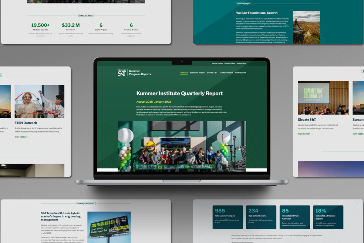 Laptop displaying the Kummer Institute quarterly report webpage surrounded by digital report pages displayed on a gray surface.