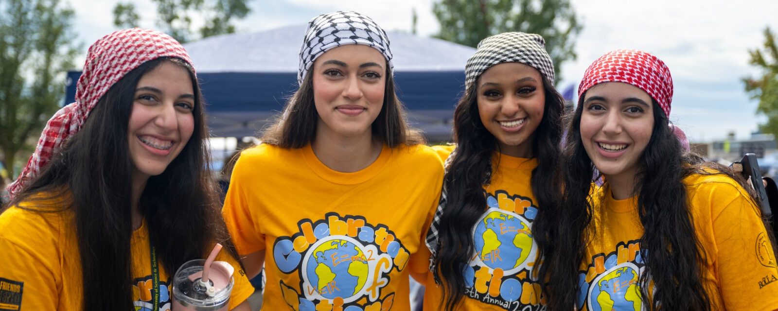 Four women posing for a picture at Celebration of Nations