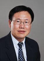 A professional headshot of Dr. Baolin Deng.