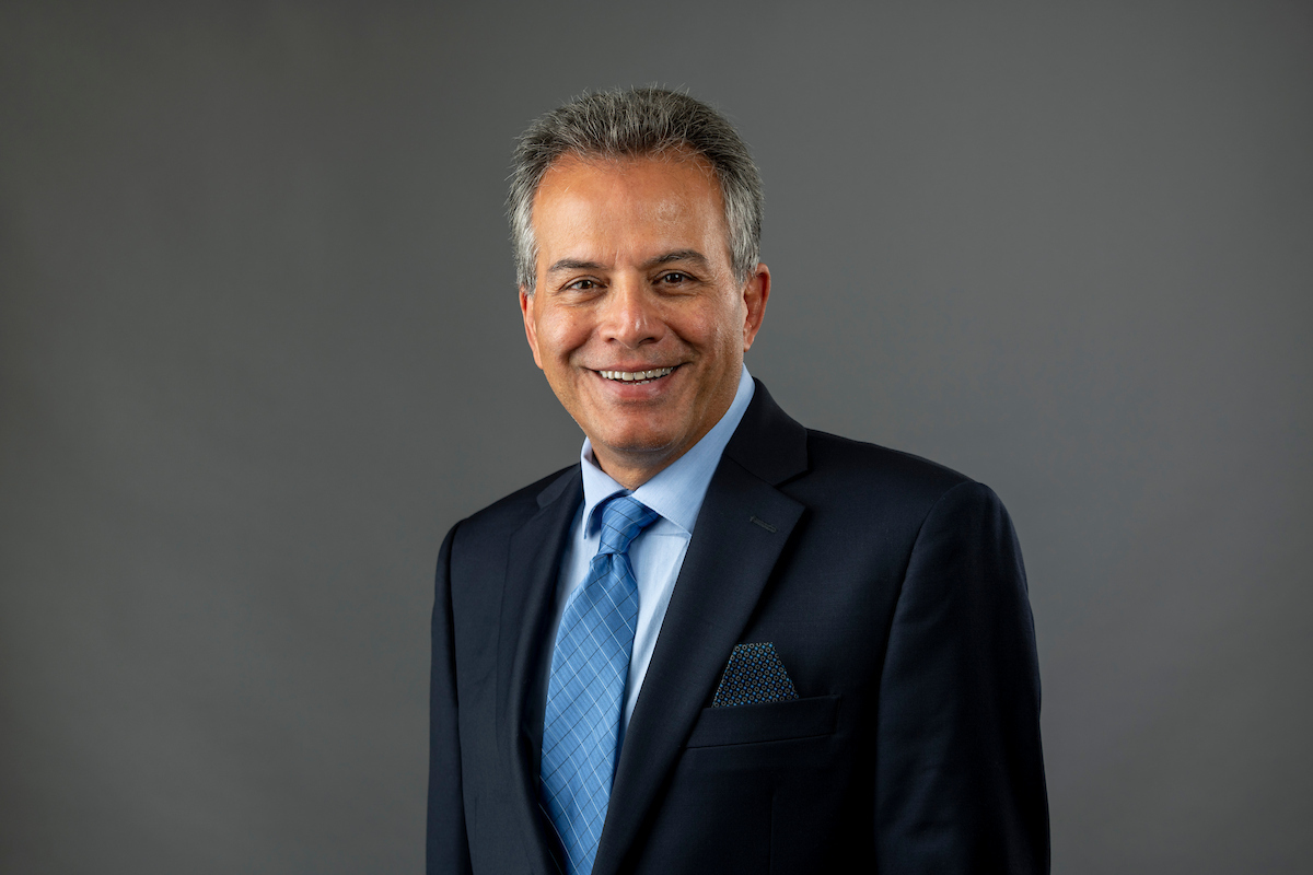 A professional headshot of Dr. Mehrzad Boroujerdi.