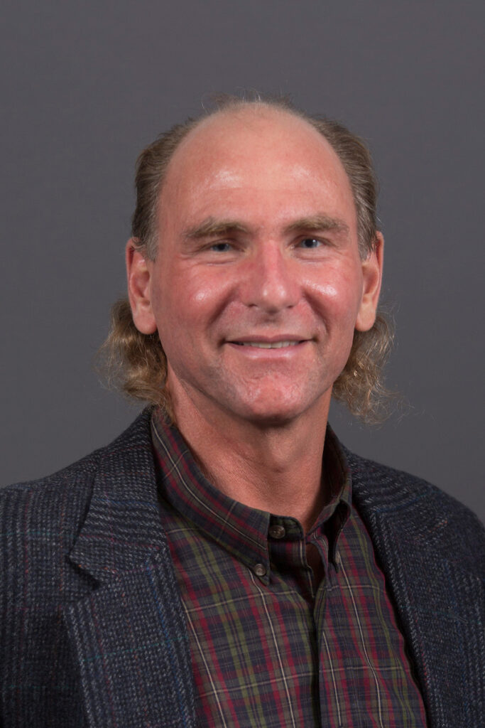 Professional portrait of Dr. Ross Reed.