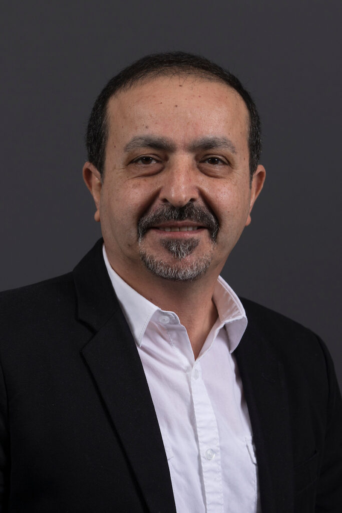 Professional headshot of Dr. Umit Koylu.