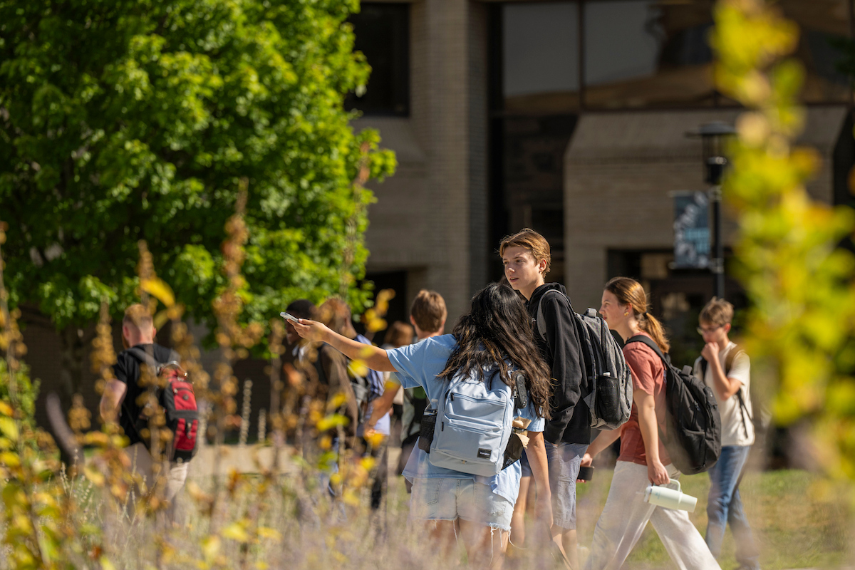 Students walk across campus with backpacks on the first day of classes at Missouri S&T in 2025.