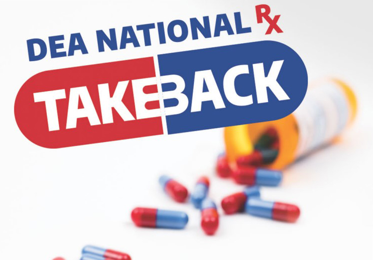 DEA National Rx Take Back logo above a tipped-over prescription bottle with red-and-blue capsules.