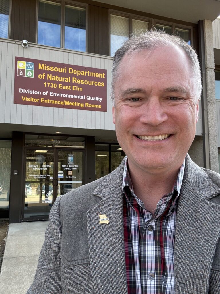 Person outside the Missouri Department of Natural Resources Division of Environmental Quality building in Jefferson City.